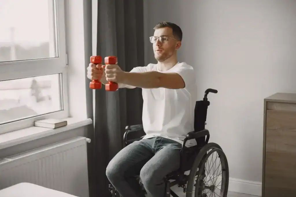 Empowering Weight Loss: A Comprehensive Guide for Individuals with Disabilities 1 Image of man doing exercise in his wheelchair to aid weight loss Bournemouth