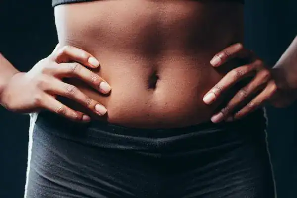 Toning Your Stomach: The Ultimate Guide to Achieving a Sculpted Stomach While Shedding Pounds 1 Image of a toned stomach after non surgical treatment Bournemouth
